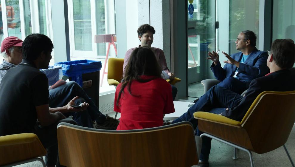 people sitting around a table.